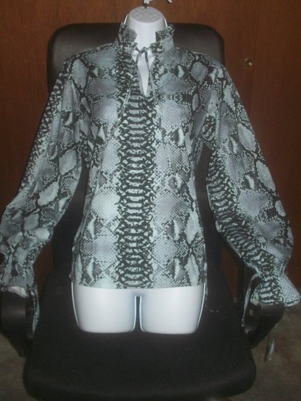 womens spring blouse. button front.snake pattern.size small
